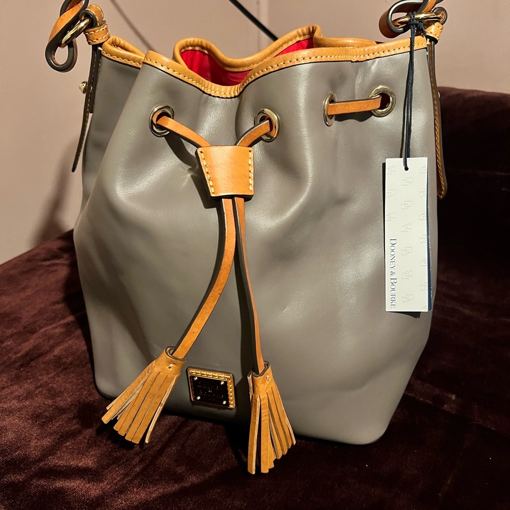 - Dooney & Bourke Tasha Taupe Leather drawstring bucket‎ bag
